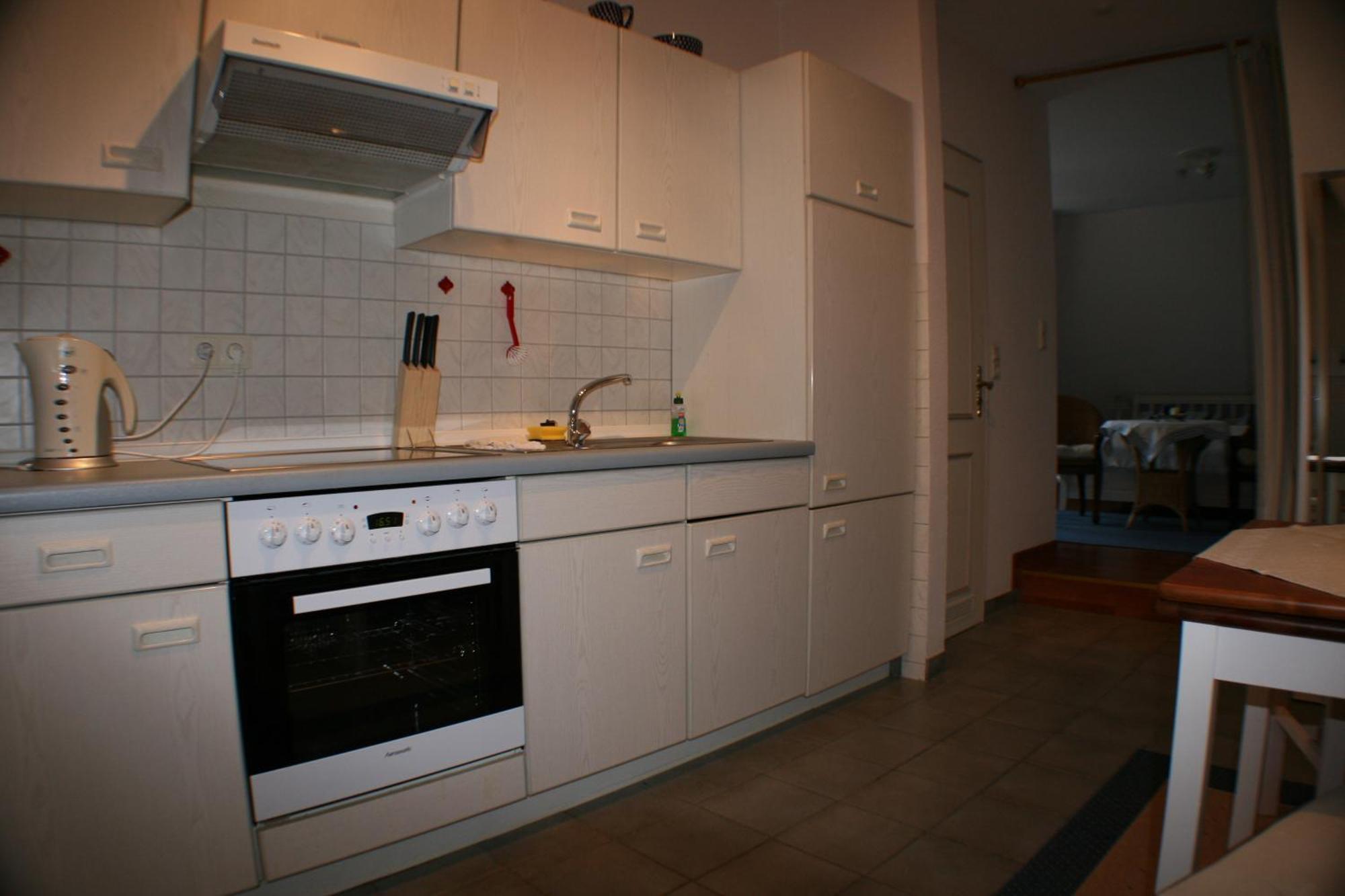 Ferienwohnungen Im Hotel Garni Zur Post Utersum Habitación foto